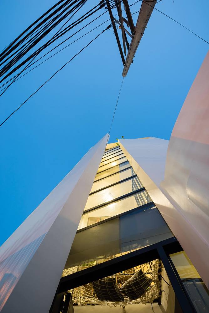 越南纸房子 | 城市拥挤空间的创意逃离-40