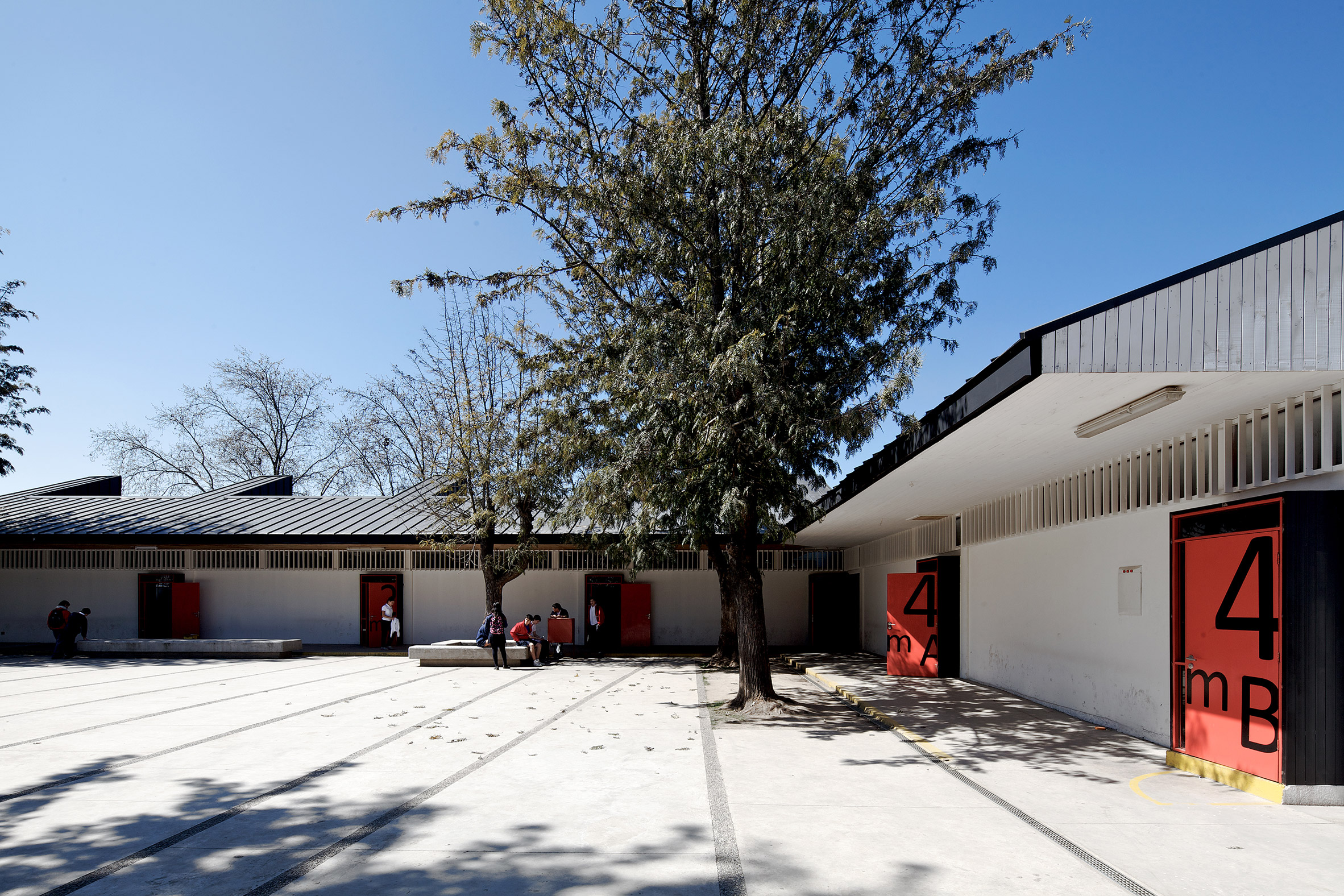 García and Soler give Chilean school a new look with light chimneys and metal cladding-6