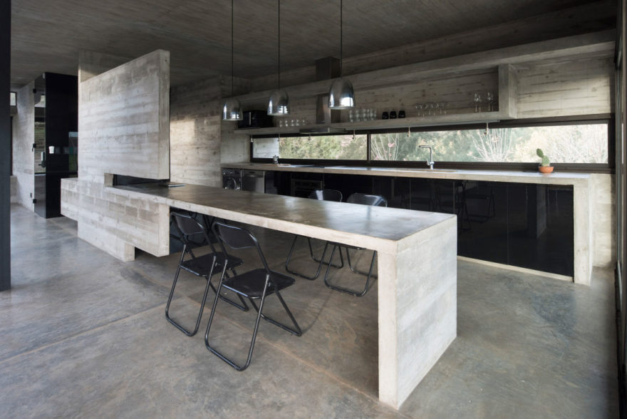 Spectacular Concrete House Surrounded by Fields and Vegetation-34