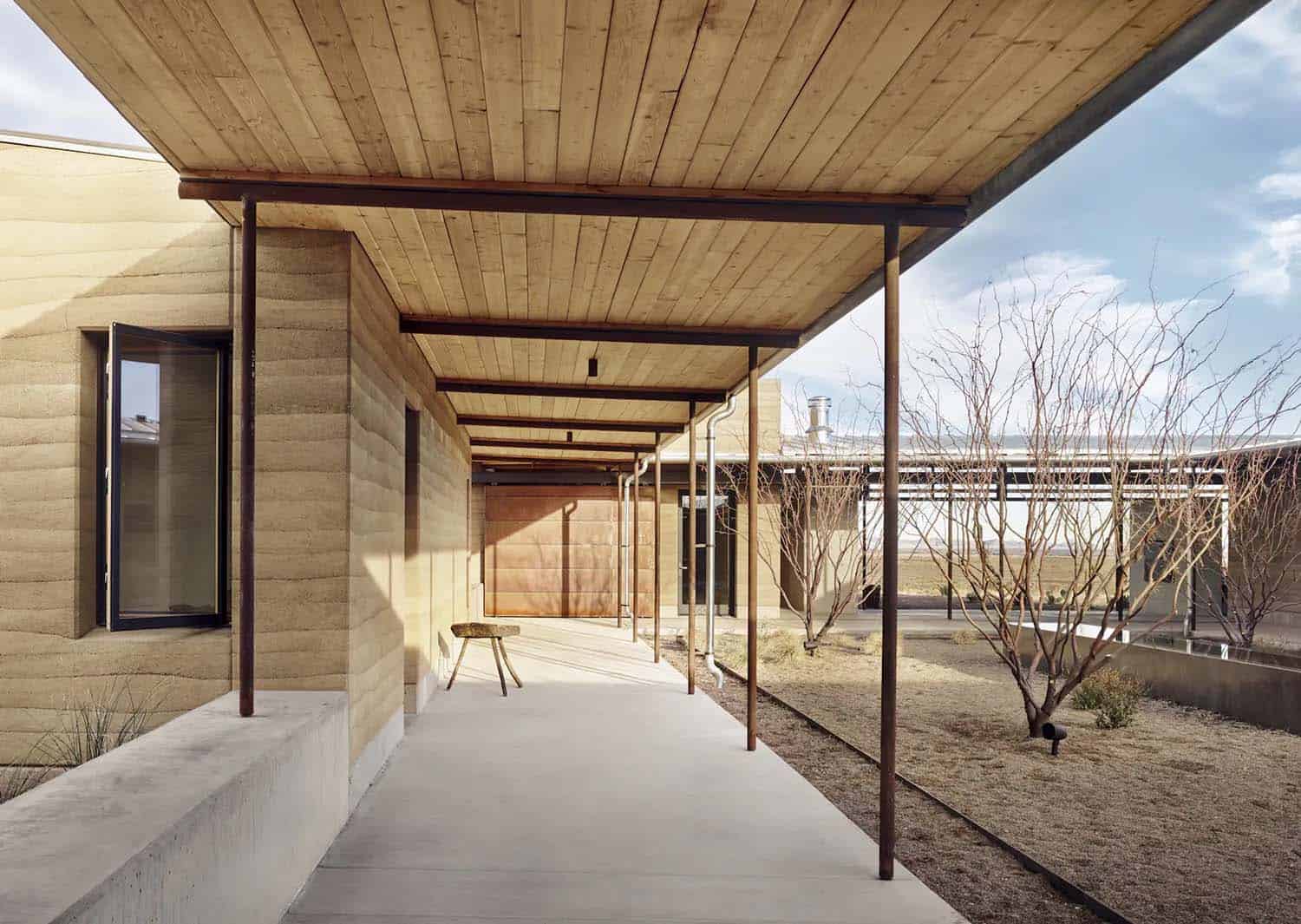 See this remarkable rammed earth house nestled on a Texas ranch-3
