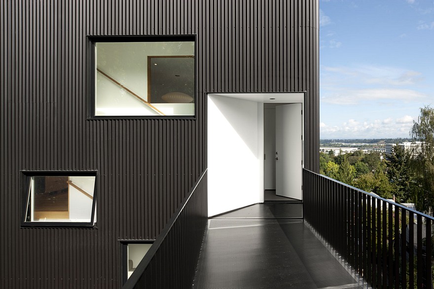 Modern Vertical House Accessed by a Steel Pedestrian Bridge-9