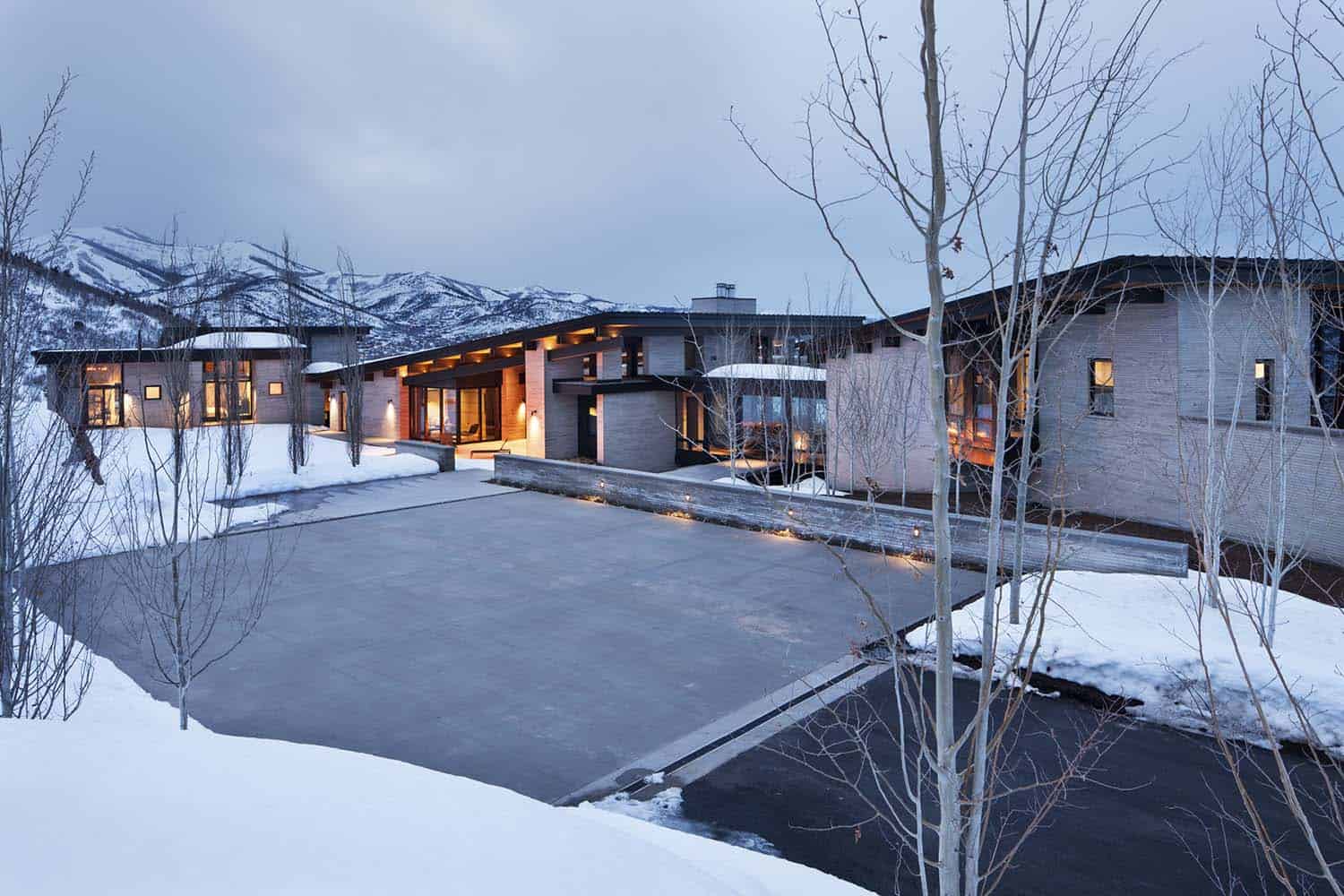Majestic mountain home of stone and glass dominates its Utah landscape-1