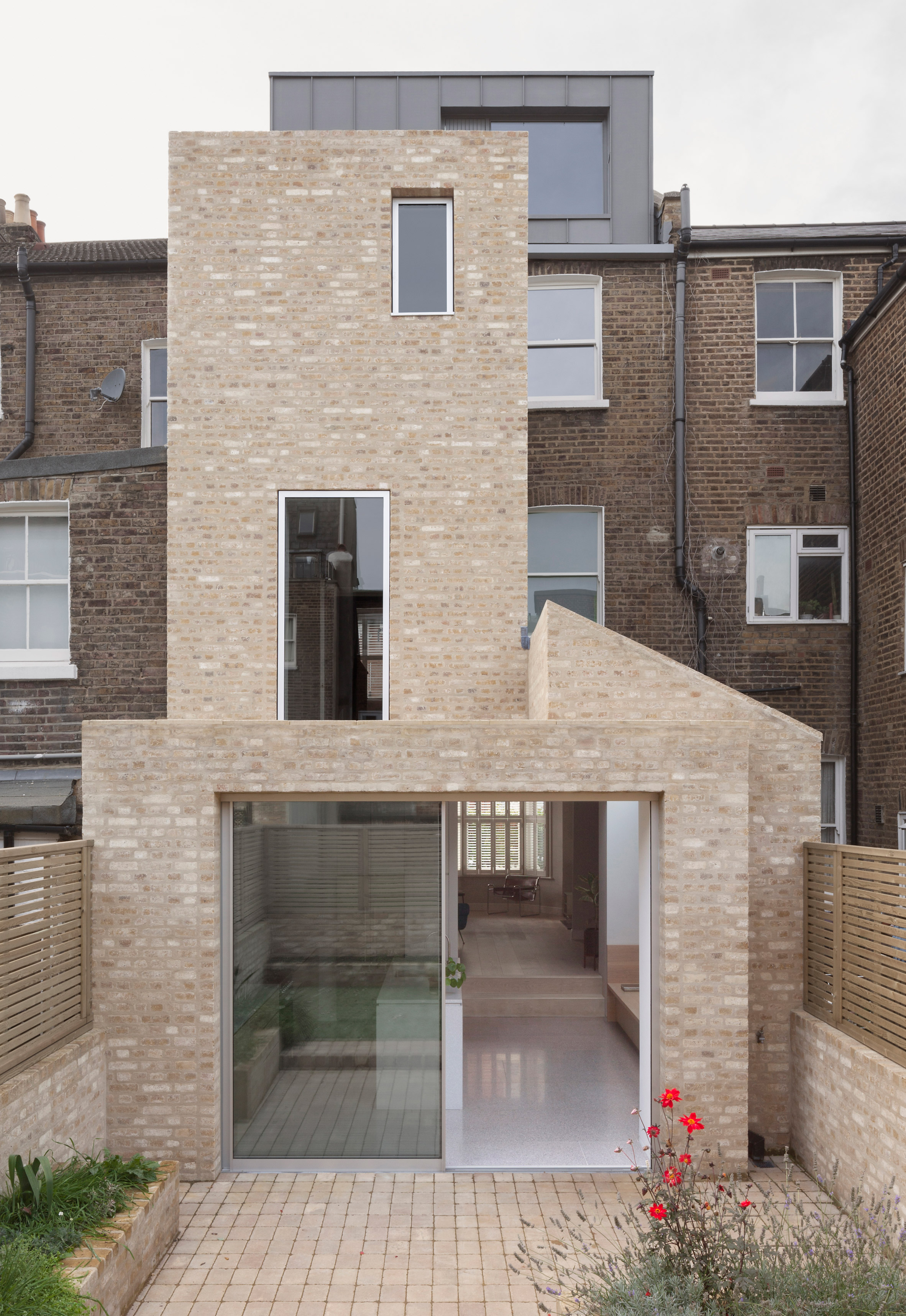 Al-Jawad Pike uses pale, exposed materials to extend west London home-5