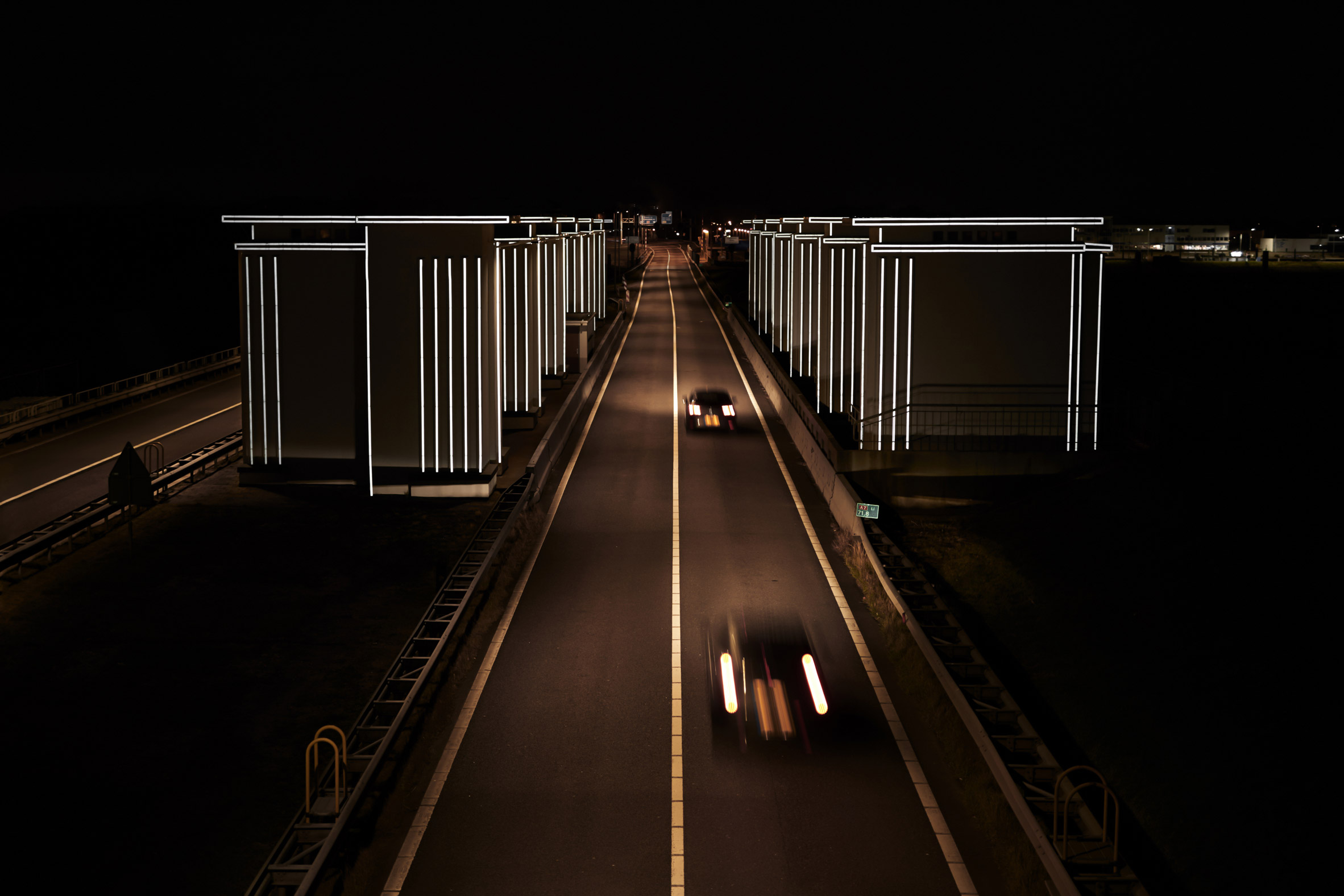 Restored floodgates by Studio Roosegaarde reflect the headlights of cars-8