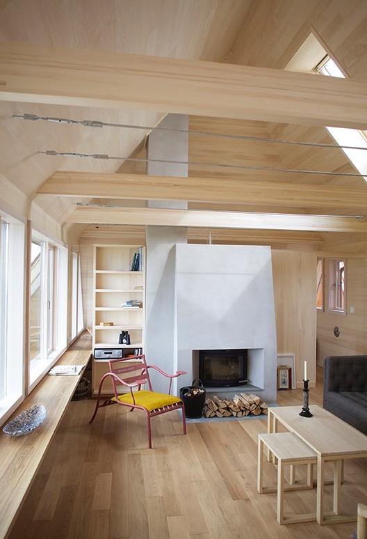 挪威海边现代共生小屋-4