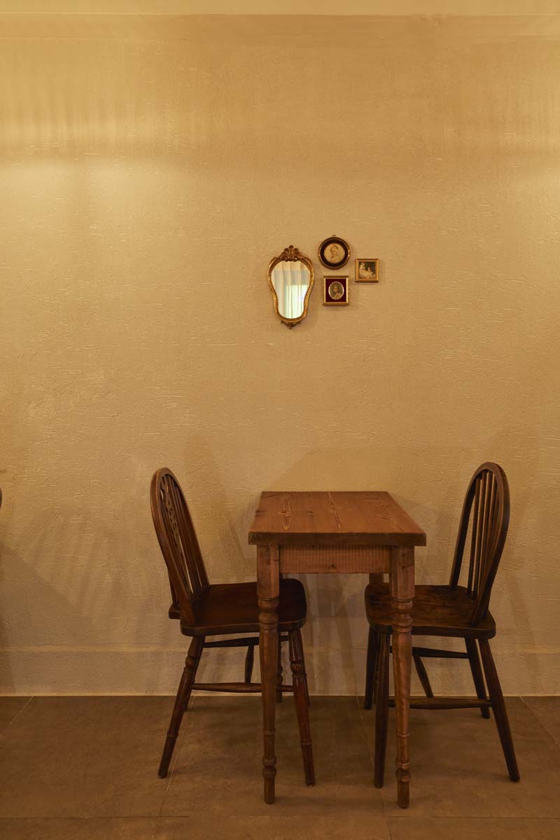 简约白色基调，9 坪咖啡厅的温馨魅力-10