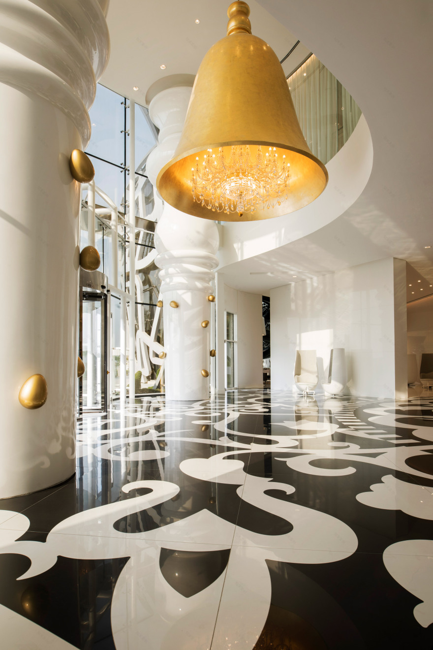 Marcel Wanders uses clashing patterns and oversized furniture for hotel-2