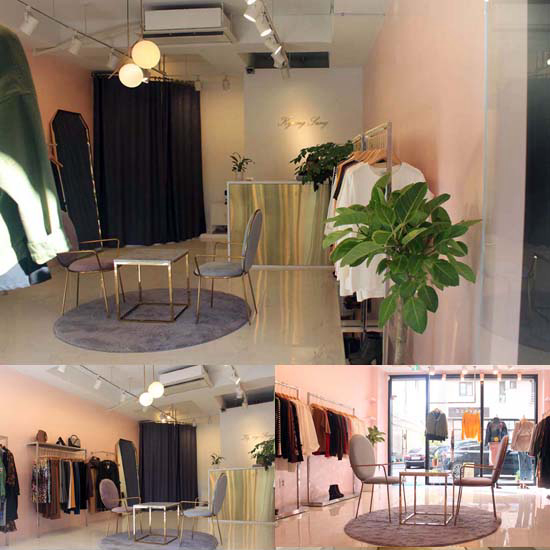 简约时尚的粉金服装店设计-1