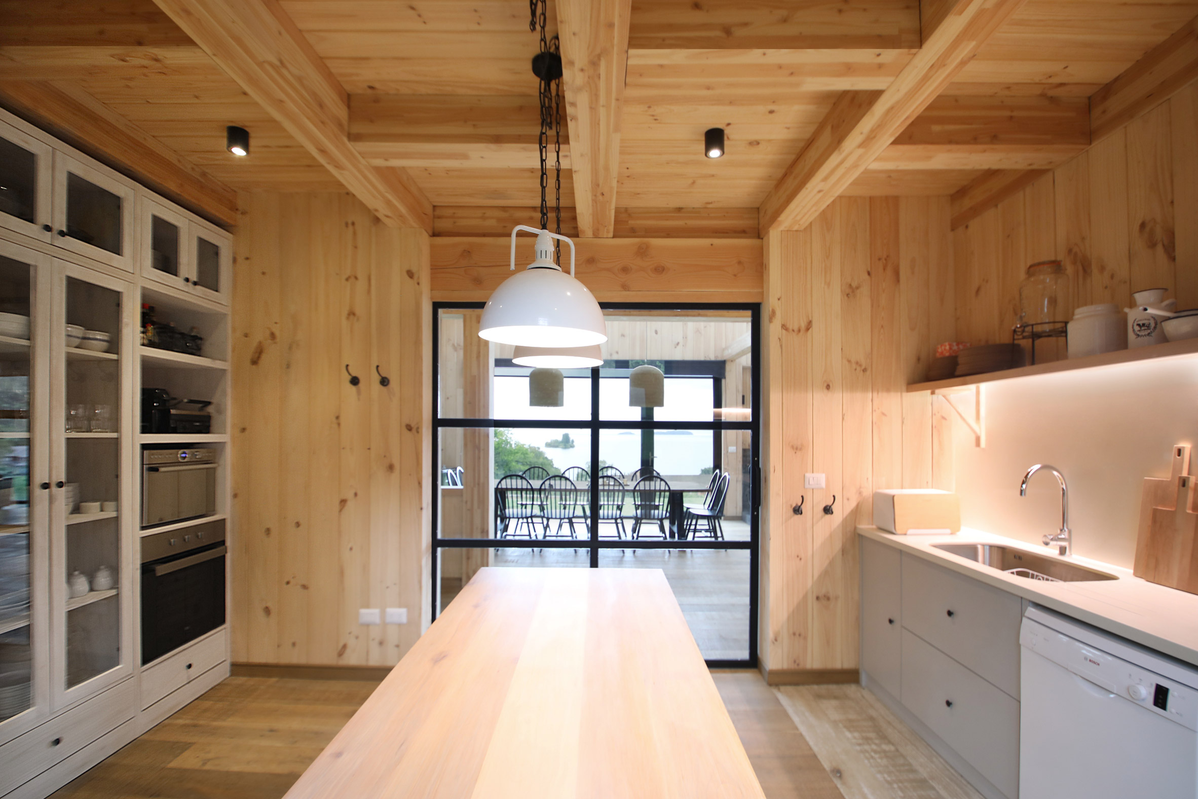 Apio Arquitectos creates gabled holiday house overlooking Chilean lake-10