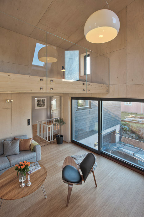 TYIN Tegnestue's lopsided house extension creates extra space upstairs-11