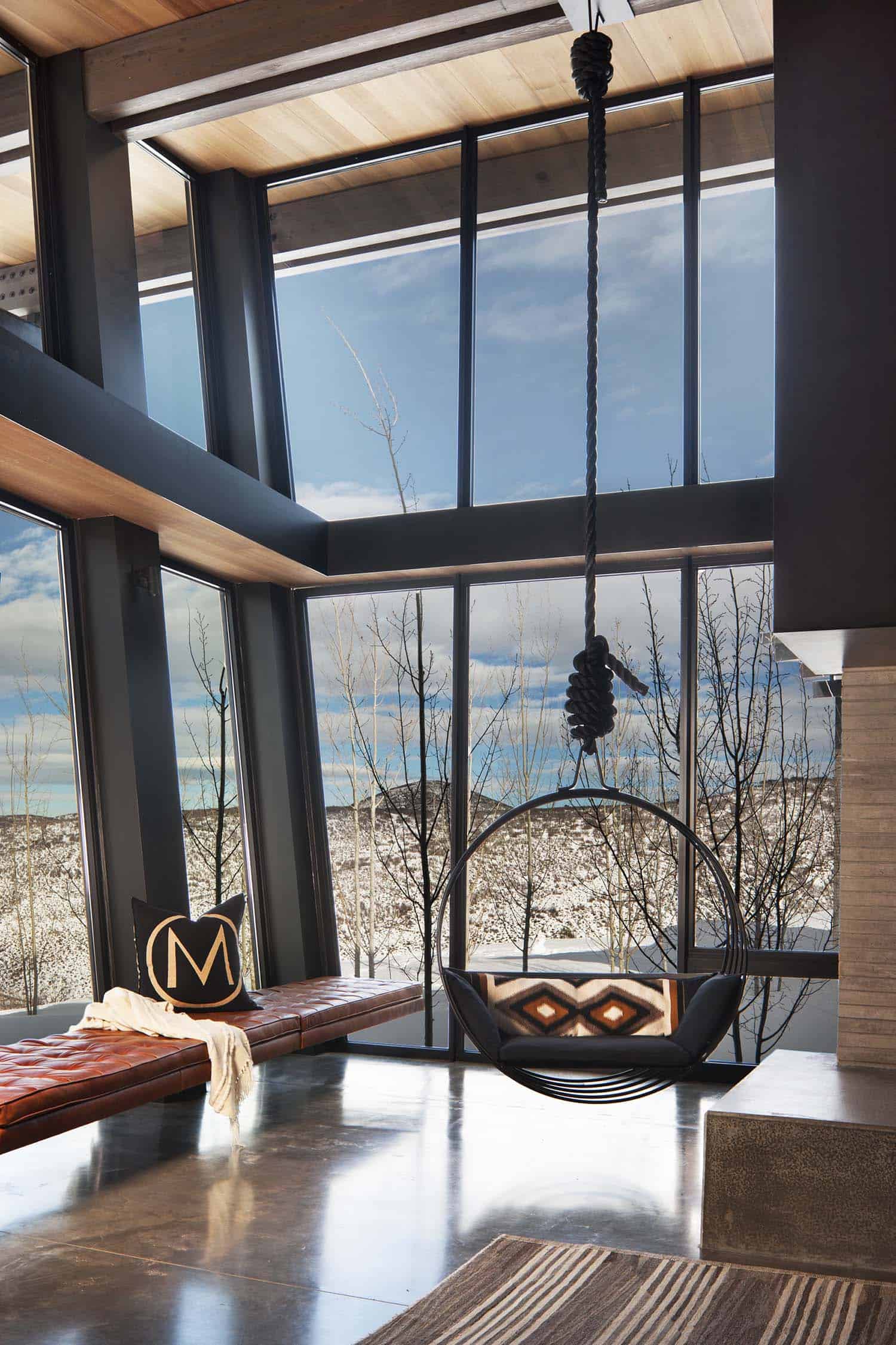 Majestic mountain home of stone and glass dominates its Utah landscape-7