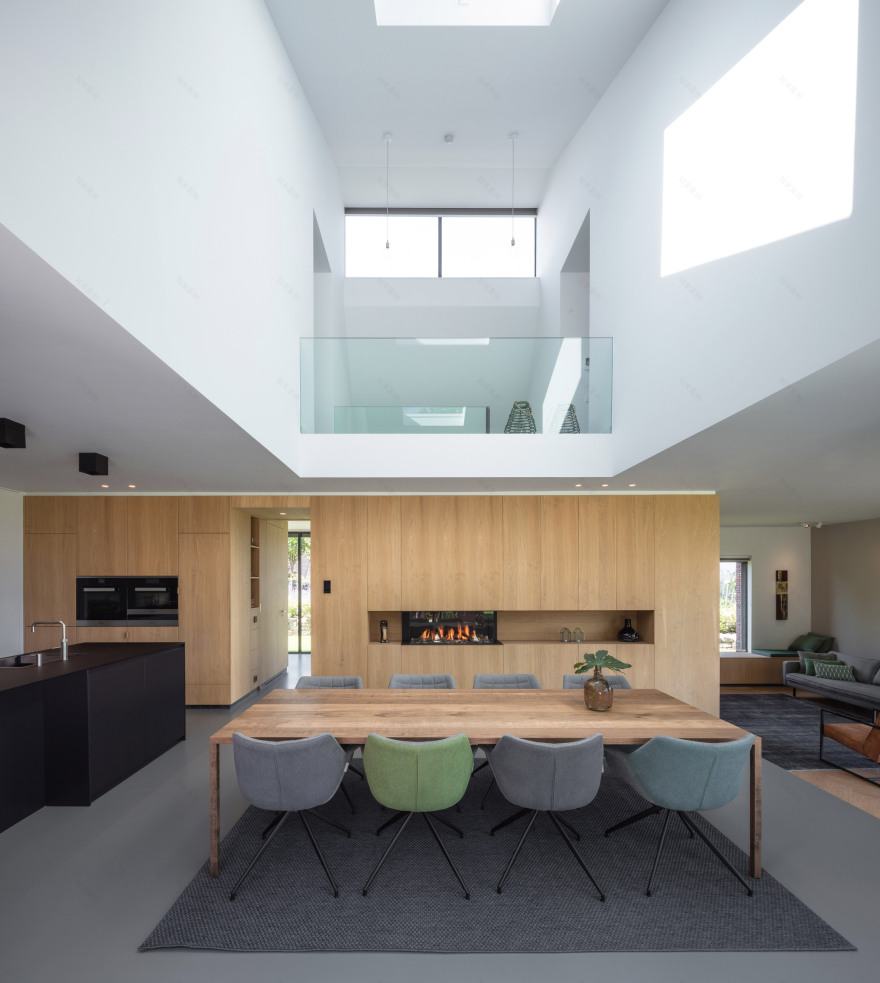 EVA Architecten's riverside house features brick and patinated copper-15