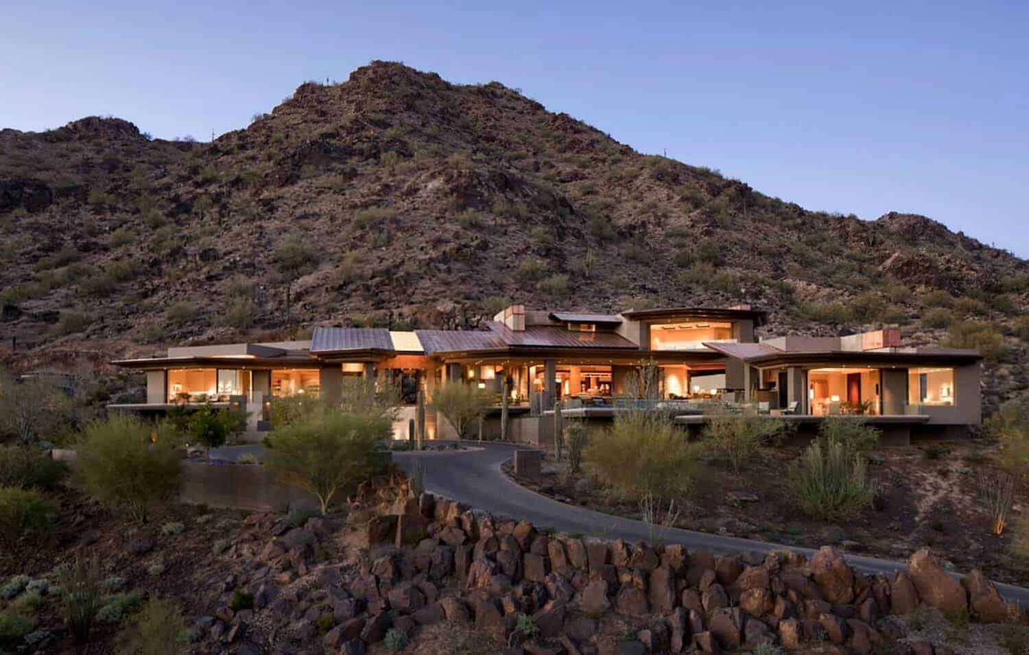 Modern desert home set on a rocky hillside with spectacular city views-0
