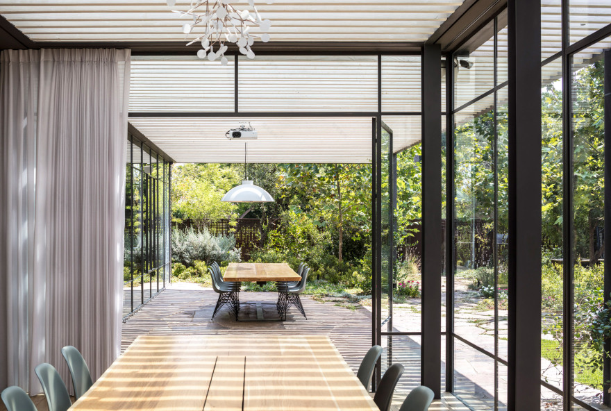 Glass walls and covered walkways intertwine Israeli house and garden-11