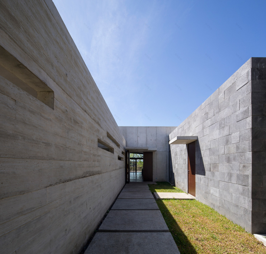 Grove of trees shades hillside Costa Rican house by Carazo Arquitectura-6