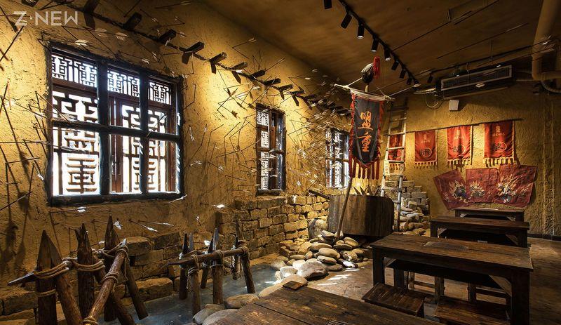 《传奇》游戏特色融入长沙盟重烧烤店设计，展现独特室内空间-0