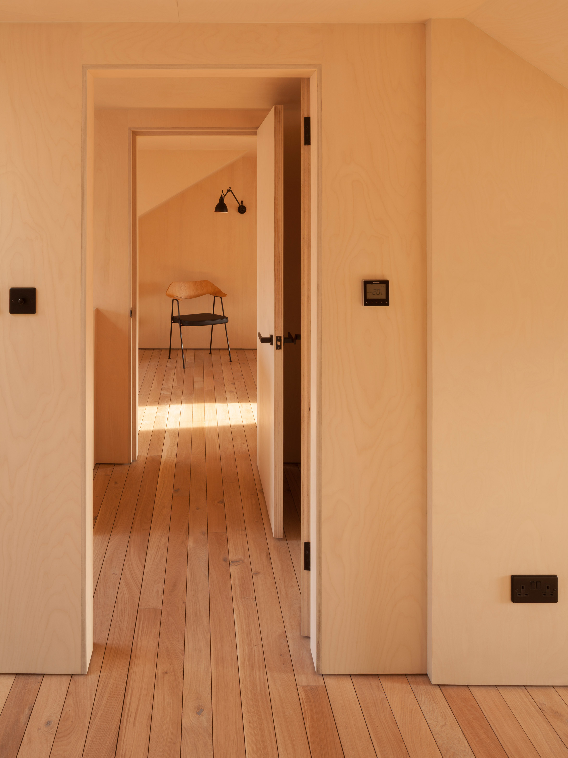 Plywood-lined bedrooms feature in loft conversion by Widger Architecture-8