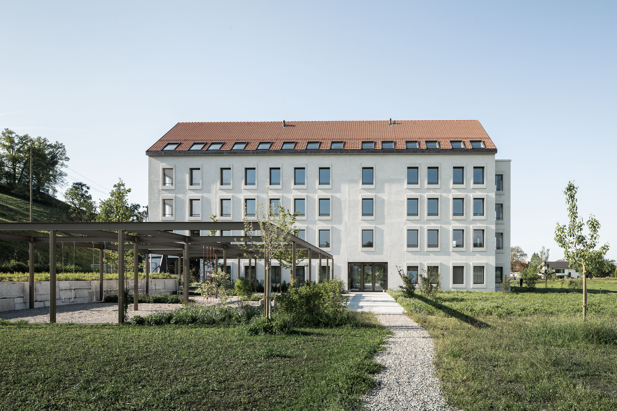 Mülihof Hotel and Residential Building / Bob Gysin Partner BGP-34