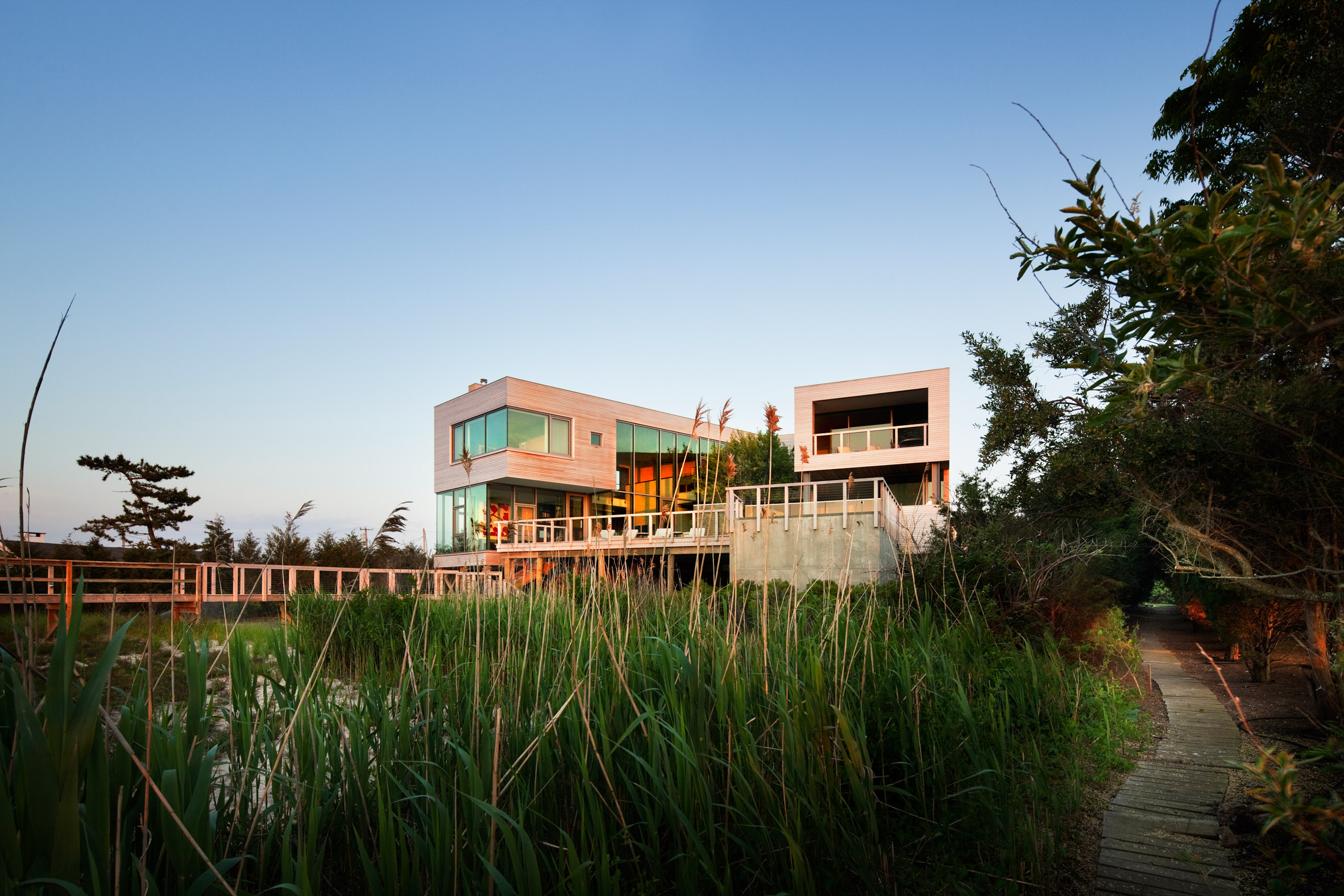 Leroy Street Studio lifts Hamptons house above the water on stilts-2