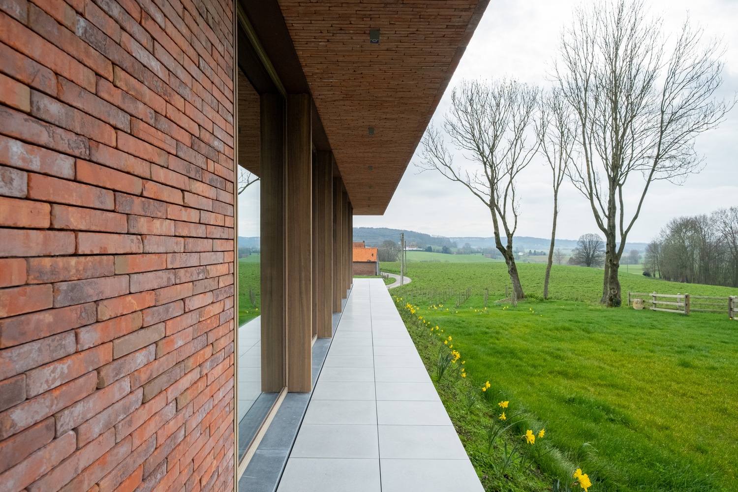 乡间清水混凝土别墅丨比利时丨马腾斯范凯米尔-1