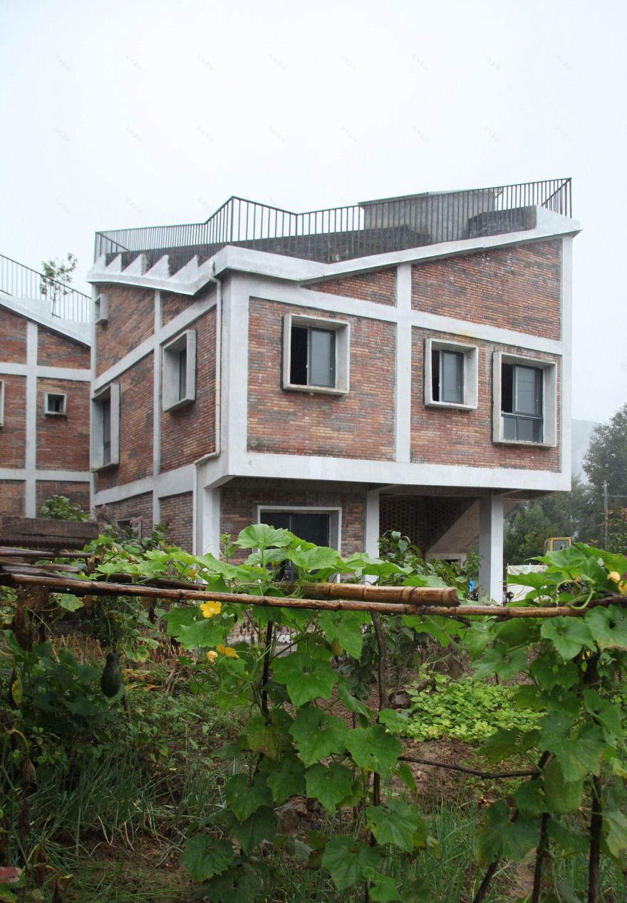 Rural Urban Framework builds post-disaster housing in China-6