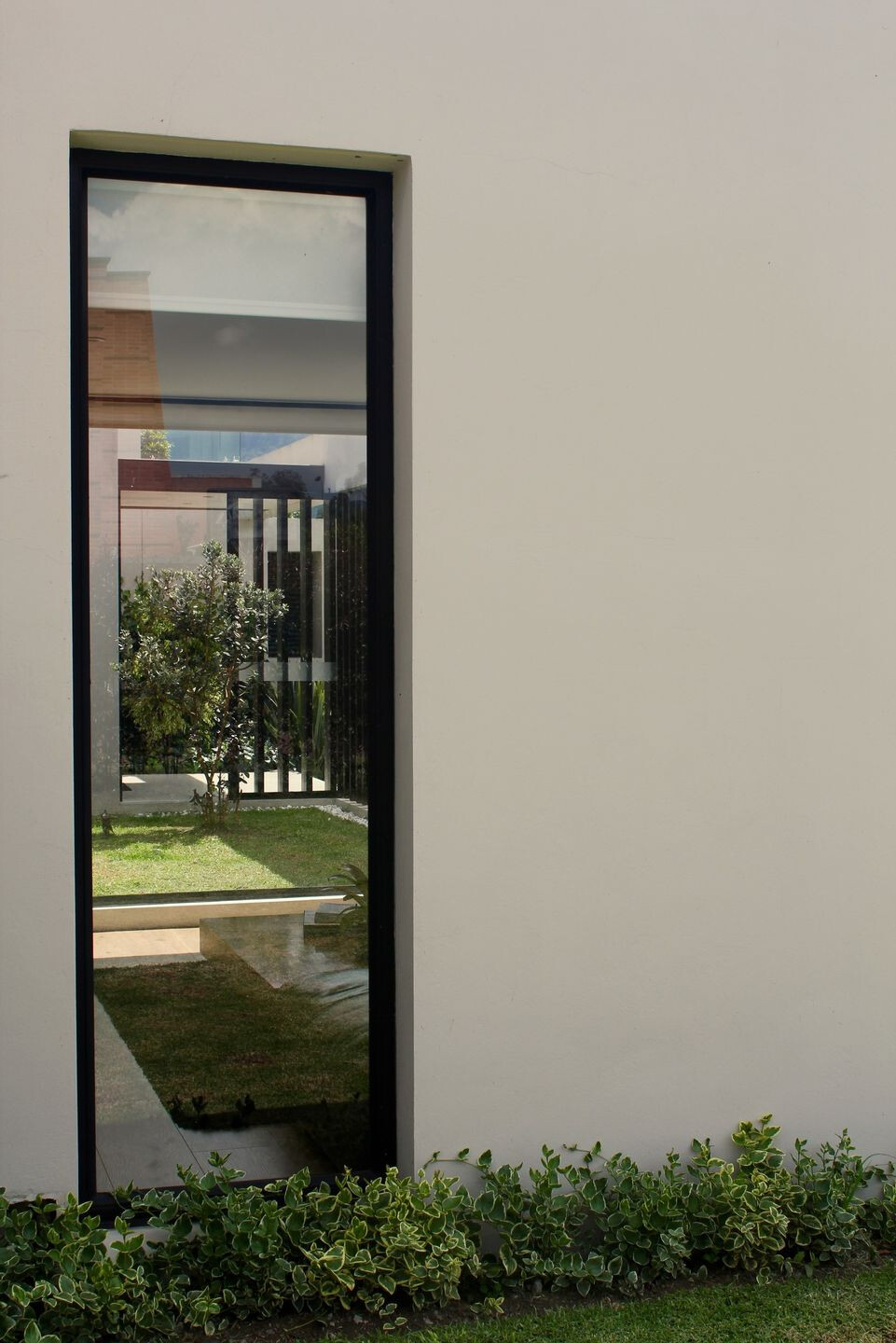 哥伦比亚 L 型别墅 · Campuzano Arquitectos 的室内外一体化设计-13