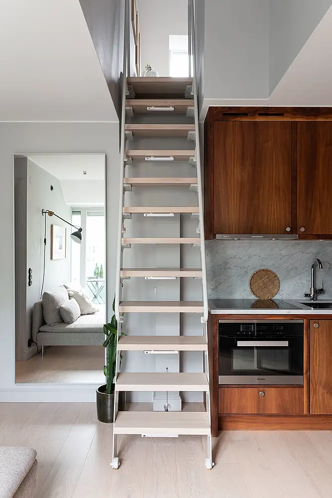 瑞典百年建筑的迷你复式公寓设计-7