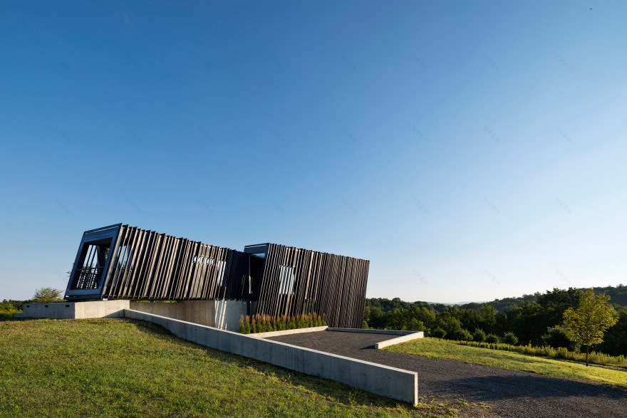 A/O builds slanted black holiday home in Hudson Valley-5