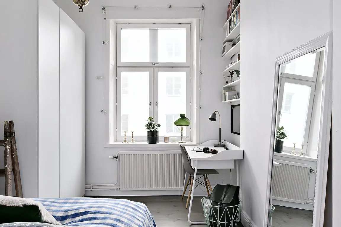 巧用家具打造 52 平米公寓的自行车收纳空间-12