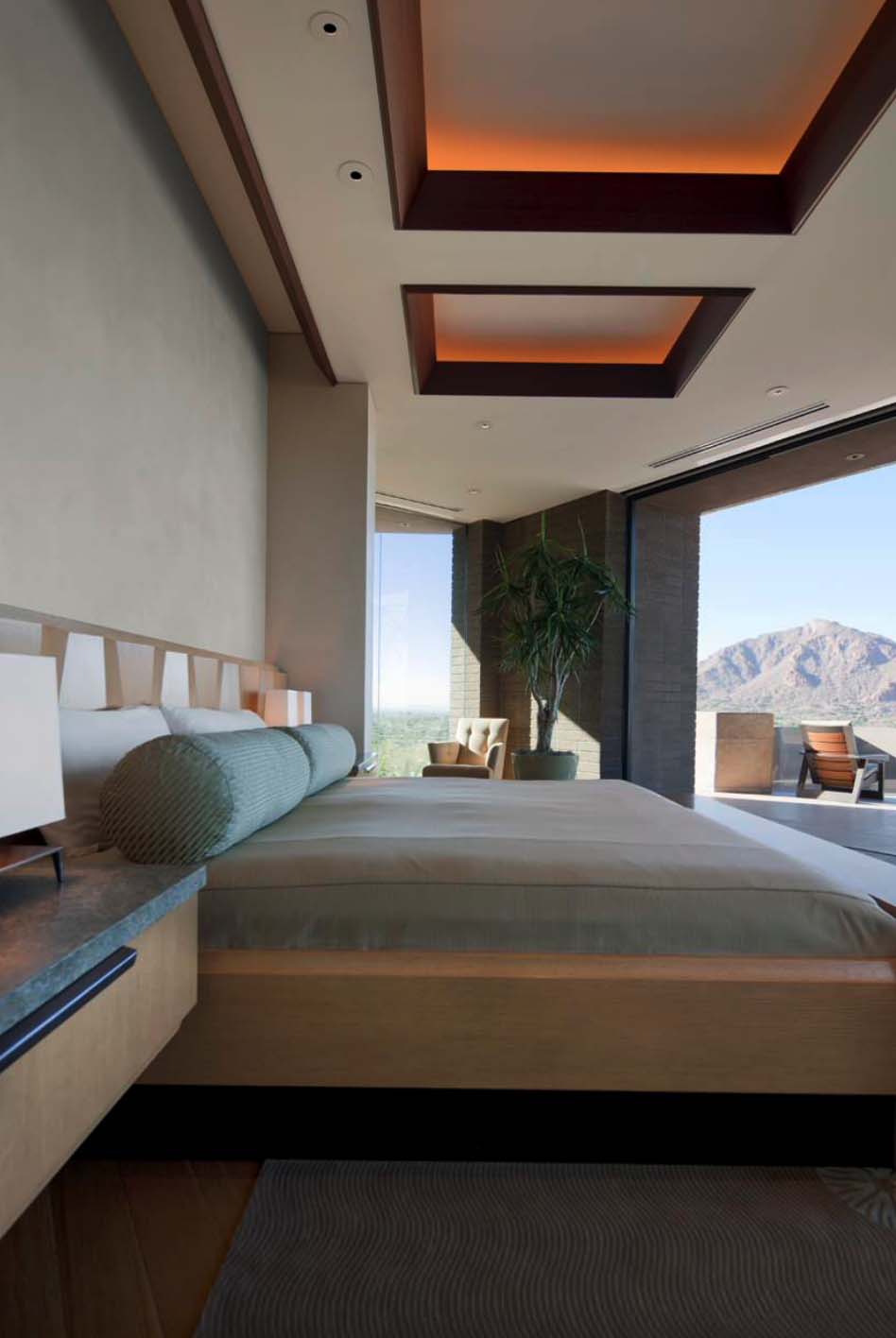 Modern desert home set on a rocky hillside with spectacular city views-18