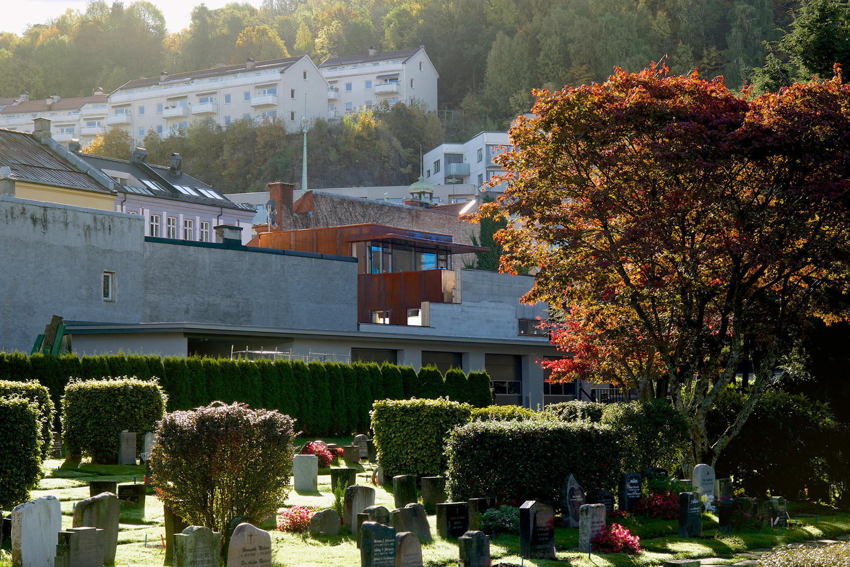Weathering steel panels create rusty walls for house in Oslo's old town-23