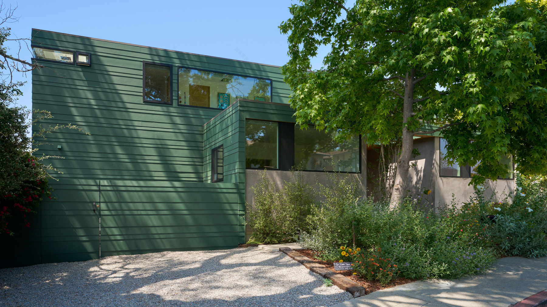 Martin Fenlon Architecture wraps Los Angeles house in woodsy green cladding-0