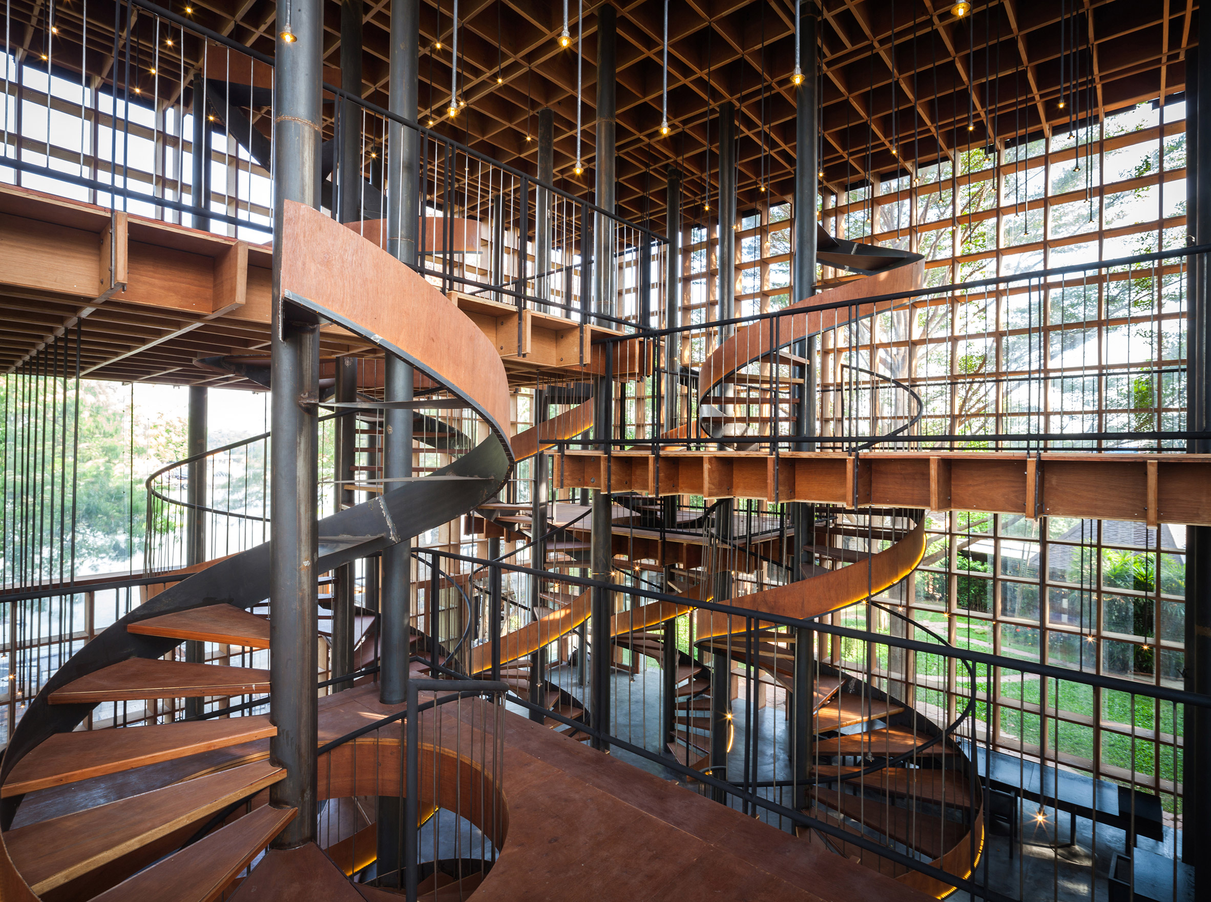 Bangkok Project Studio builds riverside wine bar with latticed plywood walls in Thailand-16