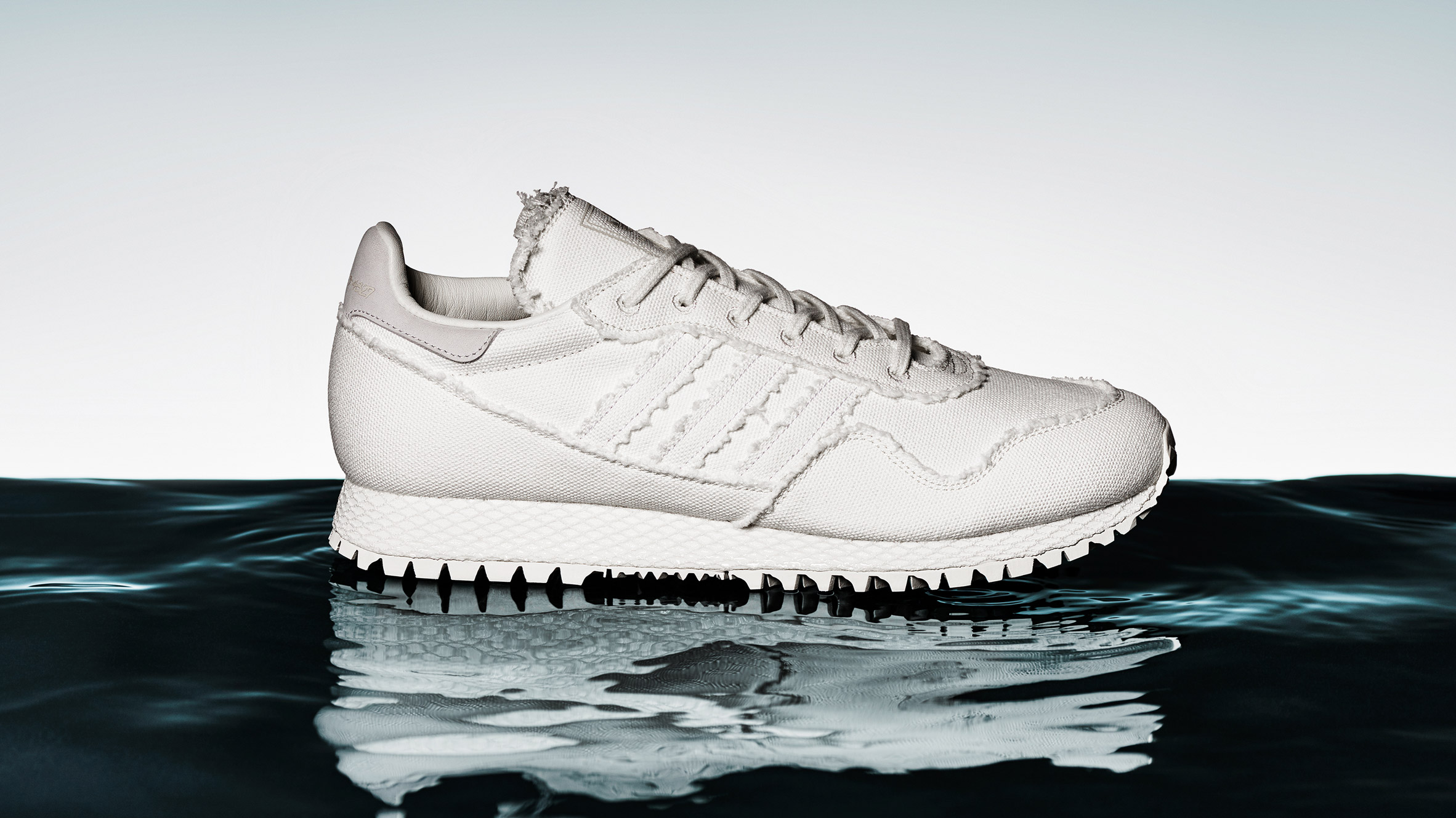 Daniel Arsham bases all-white Adidas trainers on archaeological artefacts-0