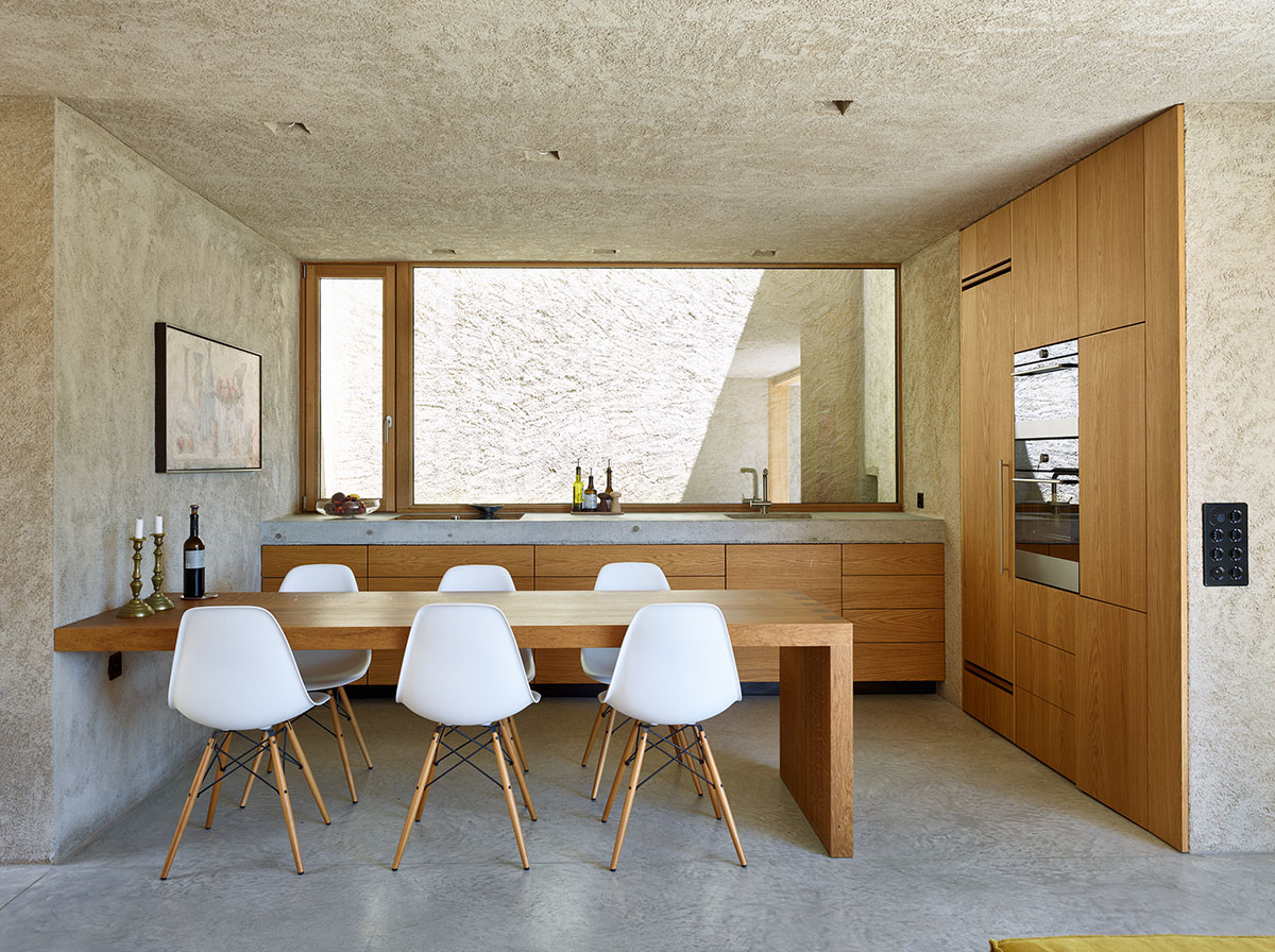 瑞士莫尔科特山坡新住宅 融入自然景观-21