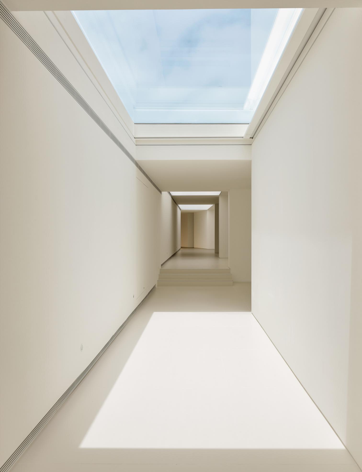 火山之家 · 线性光影的展览空间-15