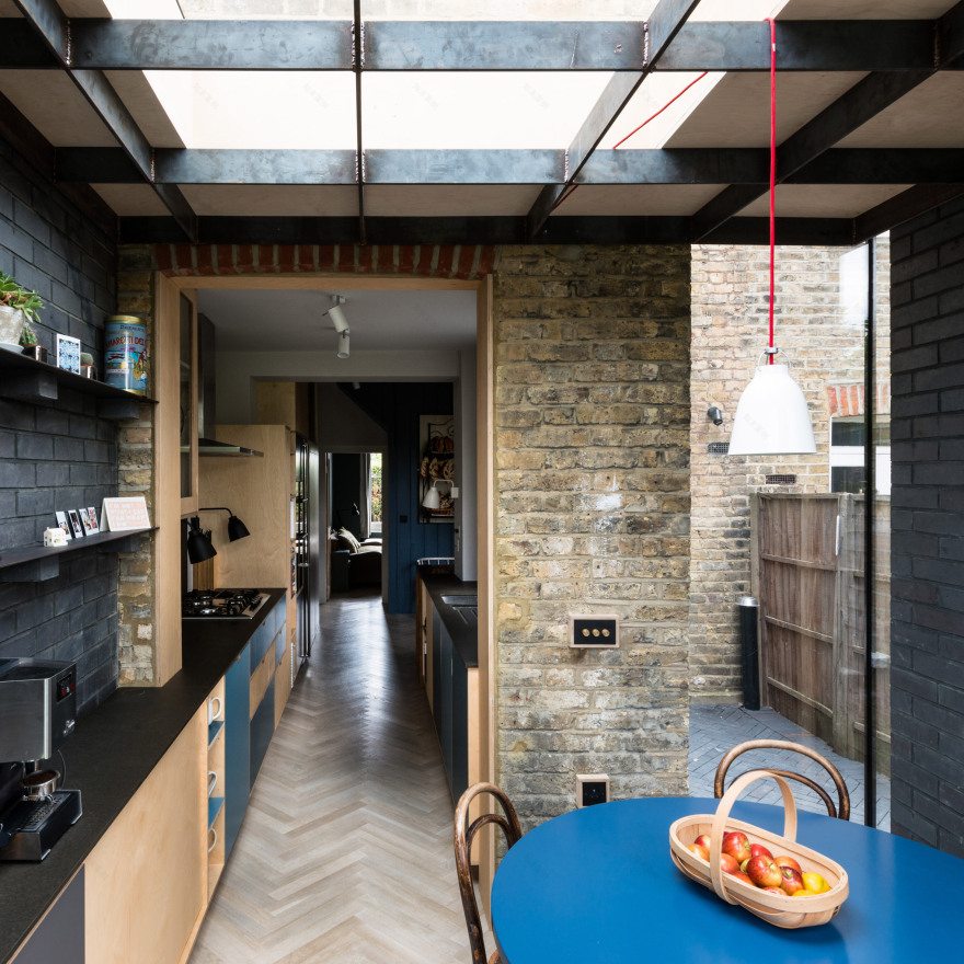 MW Architects creates 7sq m house extension in dark engineering bricks-0