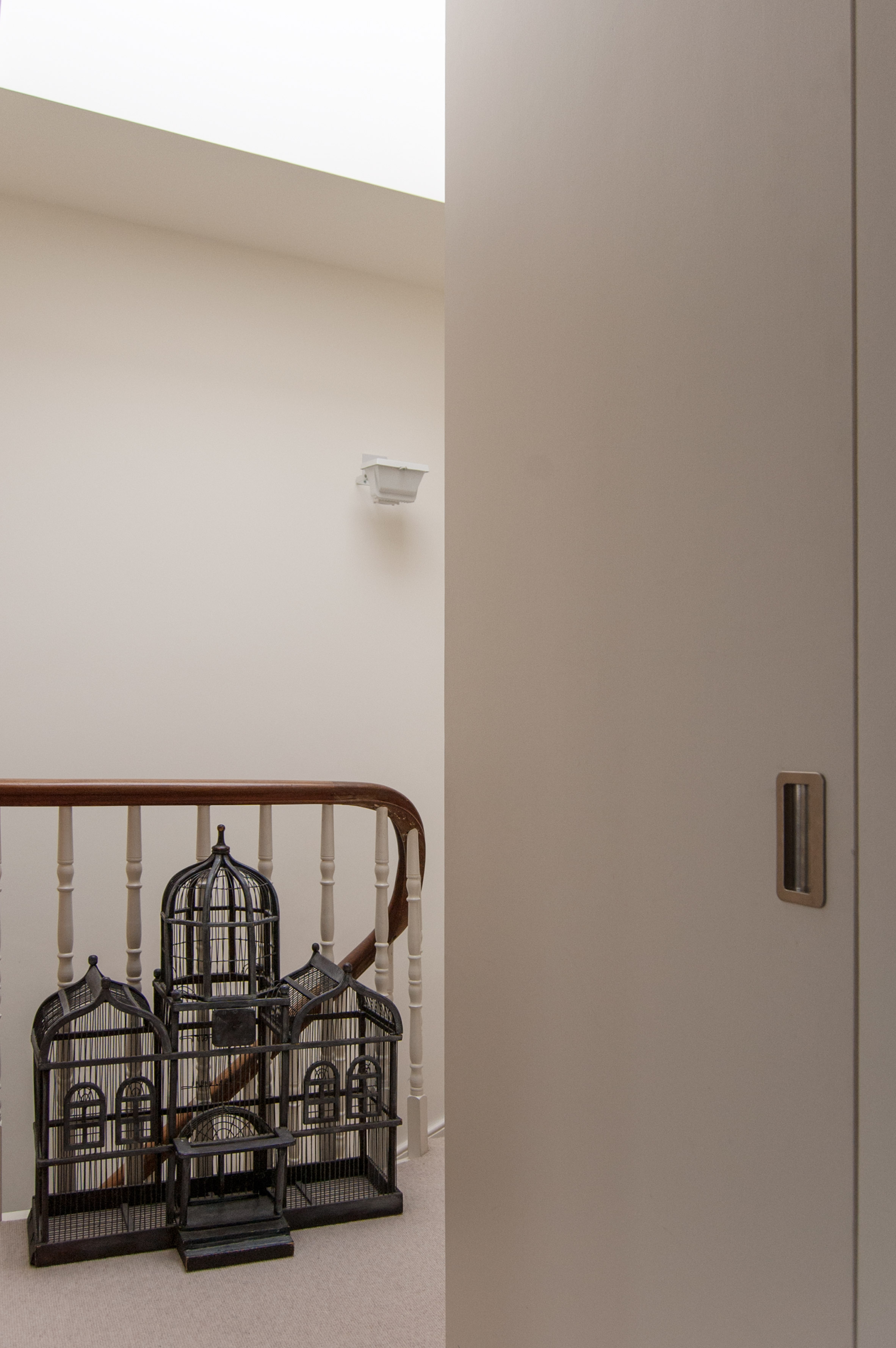 William Tozer adds white-walled living spaces to renovated Victorian house-17