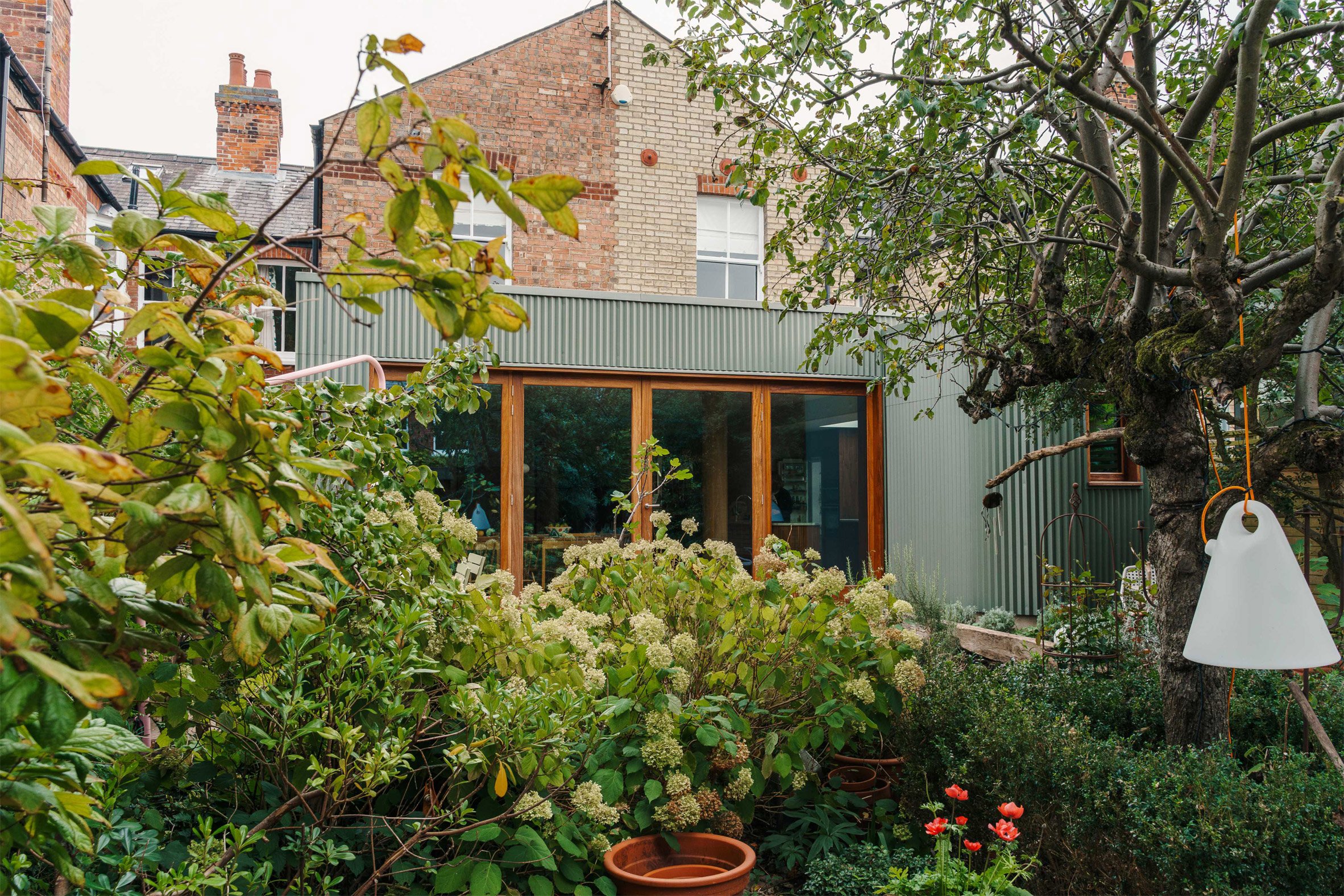 Green zinc panels "camouflage" Folded House in Cambridge by Westerdahl-3