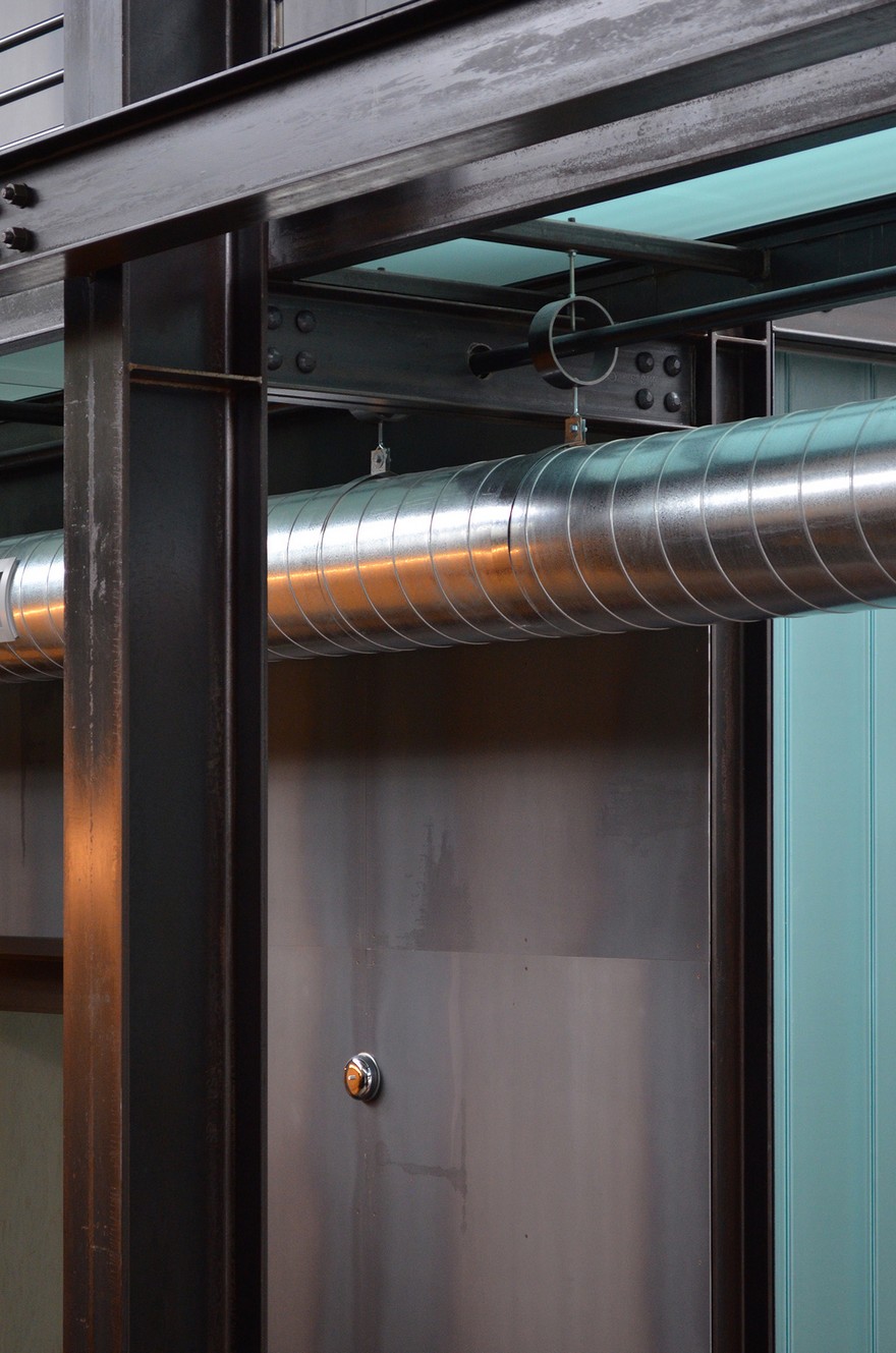 Contemporary Industrial House Features an Expressive Interior of Raw Steel-17