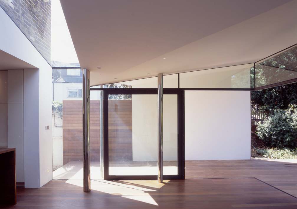 包裹屋；环绕住宅（注：Wrap House可能是有特定所指的，如一座极具特色设计、建筑外观有环绕形态的住宅，若没有更多背景信息，这两种常见理解供参考，这里按要求给出环绕住宅作为单一翻译结果）

最终翻译：环绕住宅 丨英国伦敦丨Alison Brooks Architects-50