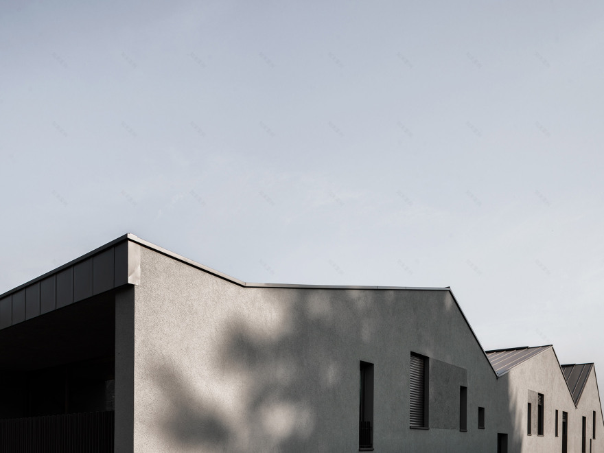 Swiss housing takes cues from mountainous landscape with zig-zag roof-5