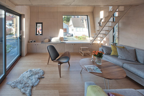 TYIN Tegnestue's lopsided house extension creates extra space upstairs-15