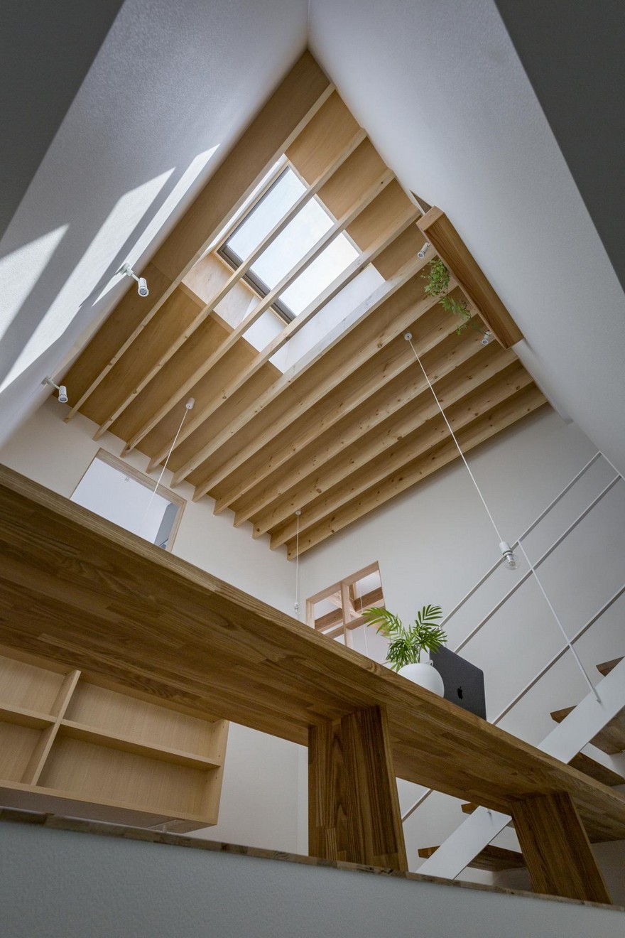 Box-Shaped Japanese Home with Warm Minimalist Interior Design-16
