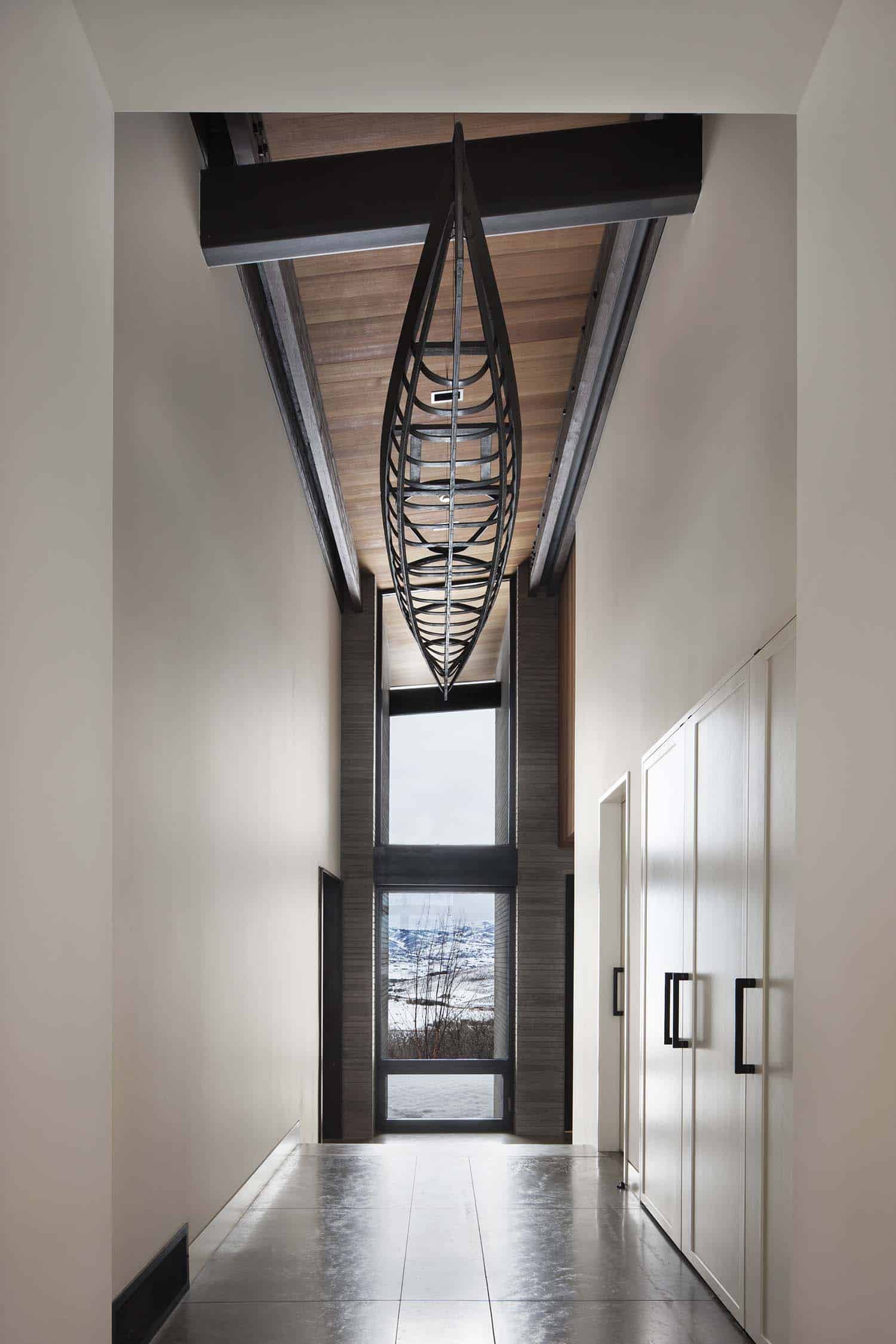 Majestic mountain home of stone and glass dominates its Utah landscape-21