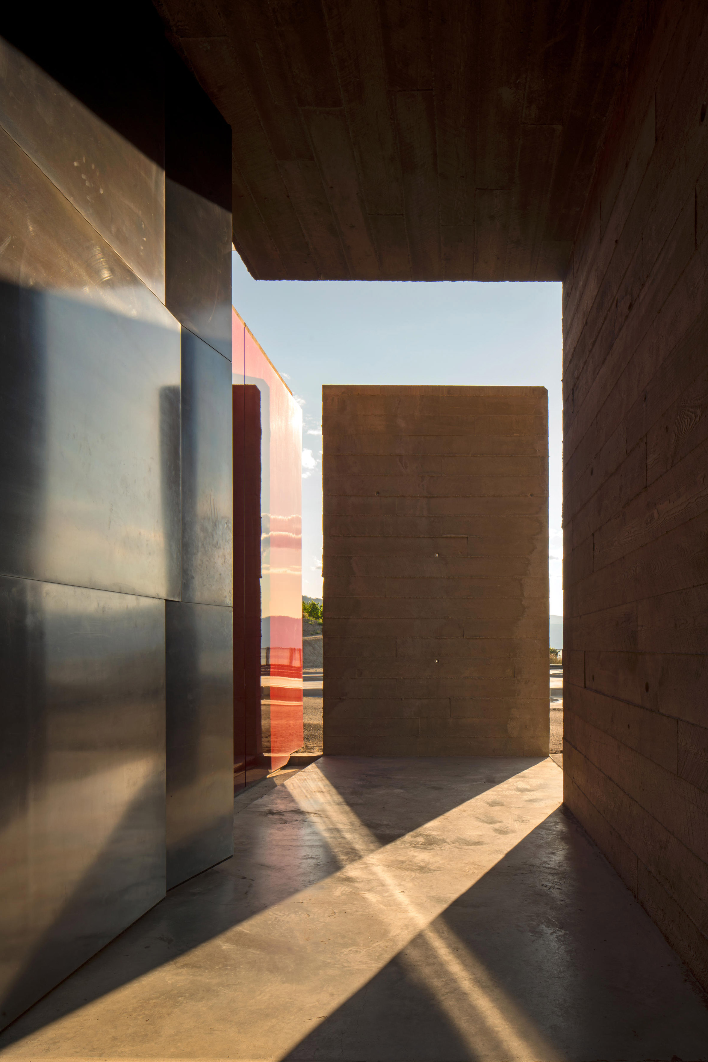 Olson Kundig embeds gravity-flow winery into British Columbia hillside-11