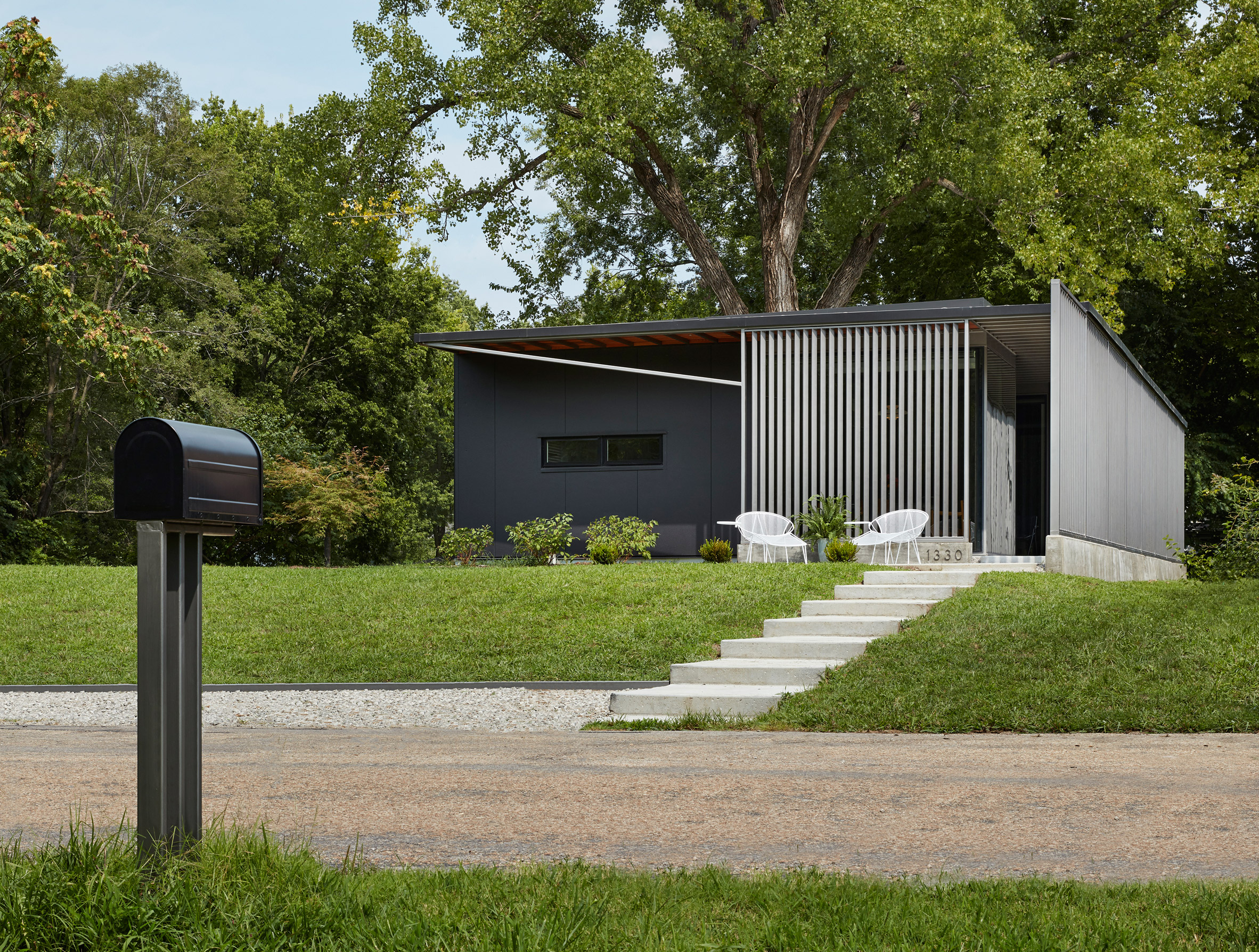 Studio 804 uses salvaged materials for sustainable home in Kansas-2