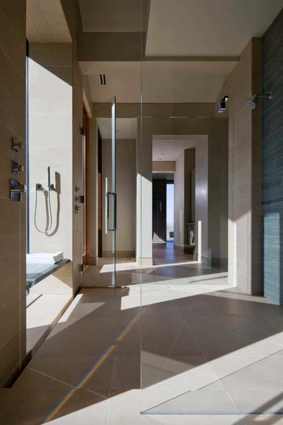 Modern desert home set on a rocky hillside with spectacular city views-21