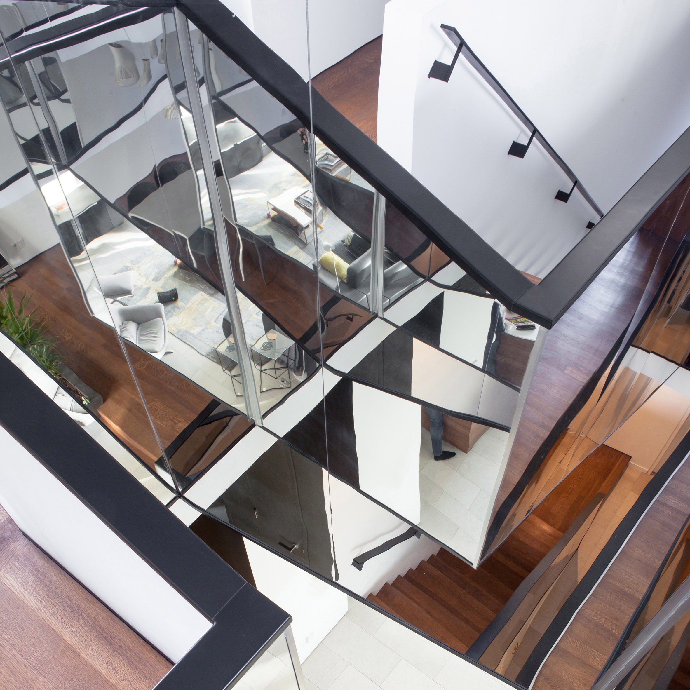 Mirrored staircase features in Kaleidoscope House by Paul Raff Studio-0