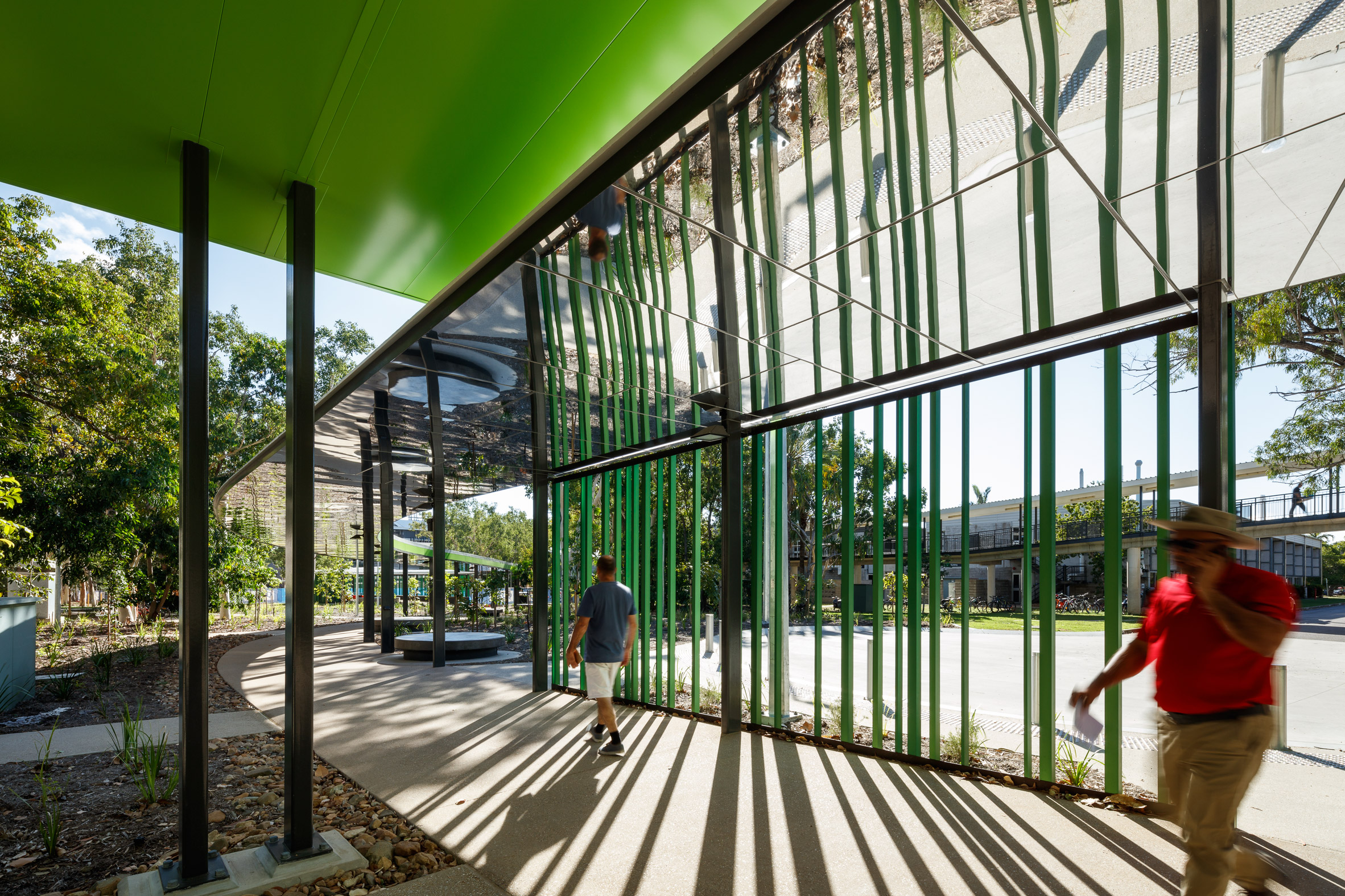 Mirrored ceilings reflect surroundings of walkway at Australian university-12